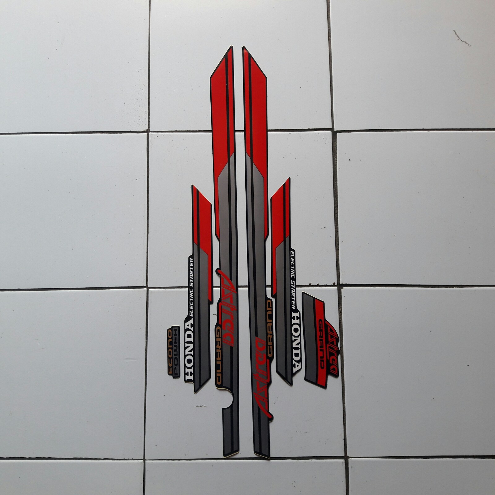 Striping Stiker Motor Honda Astrea Grand 1992 Merah-Abu Striping Stiker Motor Honda Astrea Grand 1992 Merah-Abu