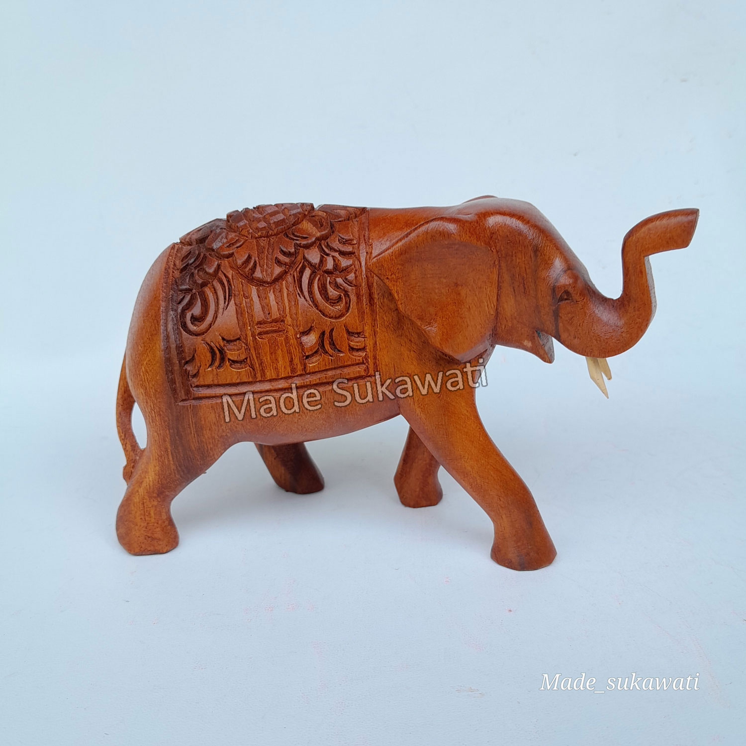 Kerajinan patung kayu gajah berjalan variasi punggung ukir handmade bali