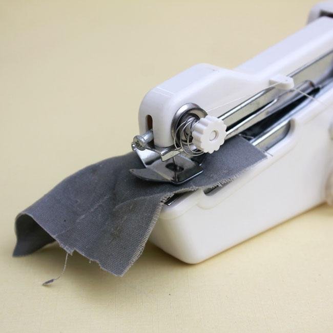 portable handy stitch handheld sewing machine putih portable handy stitch handheld sewing machine putih